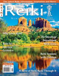 Reiki News Magazine Fall 2018 featuring red rock mountains reflecting in a calm river.