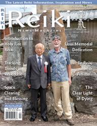 Reiki News Winter 2018 featuring two men standing in front of a stone monument.