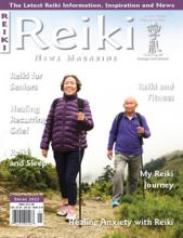 Reiki News Magazine Spring 2022 cover featuring an elderly couple hiking.