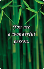 Close-up of green bamboo stalks with the message “You are a wonderful person.”