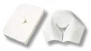 White disposable headrest covers with a central face opening, shown flat and unfolded for use on Reiki, massage, or therapy tables.