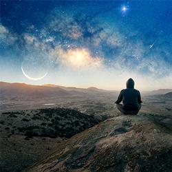 Person sitting on a rocky hill at dusk, meditating under a star-filled sky with a crescent moon and the Milky Way glowing above the landscape.