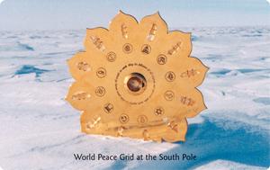 Gold World Peace Grid displayed on snowy terrain at the South Pole, with symbols arranged in a circular pattern.