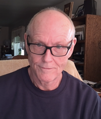 Portrait of Corey Bippes, Reiki News Magazine Team member.